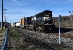 NS yard job E23 at MP 172 on the "Old Main Line" heads south en route to Montview Yard with four cars received from CSX.  The McBride Sign Company's flag waves on the Amherst County side of the James River.